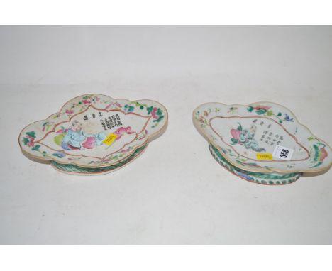 A pair of Japanese shaped dishes with enamel and floral figure decoration.