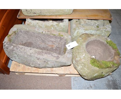 A rectangular stone trough approximately 26 x 15in; and a stone mortar, irregular shape, approximately 17/18in. diameter.