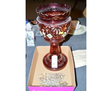 A Victorian ruby glass table lustre with floral decoration and cut glass drops.