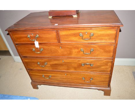 A 19th Century mahogany chest of two short and three long graduated drawers, fitted brass swan neck handles raised on bracket