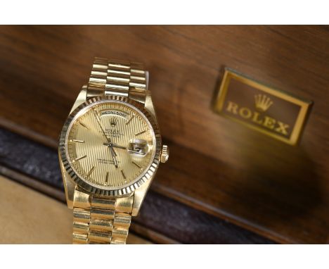 Rolex Oyster Perpetual Day-Date 18ct gold gentleman's automatic wristwatch ref. 18238 with day and date apertures, baton hour