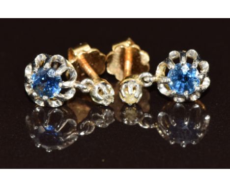 A pair of 18ct gold earrings each set with a round cut sapphire of approximately 0.2ct&nbsp;and a rose cut diamond, 2.6g