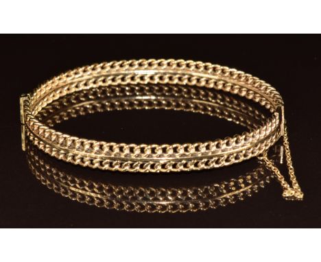 A 9ct gold bangle made up of two rows of curb links, 13.4g, 4.8 x 6cm&nbsp;
