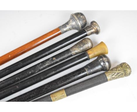 Six hallmarked silver and white metal and horn mounted walking sticks / riding crops, longest 93cm  