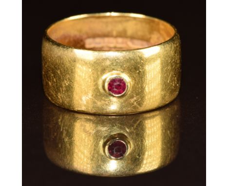 A 22ct gold wedding band / ring set with a ruby, 9.5g, size O