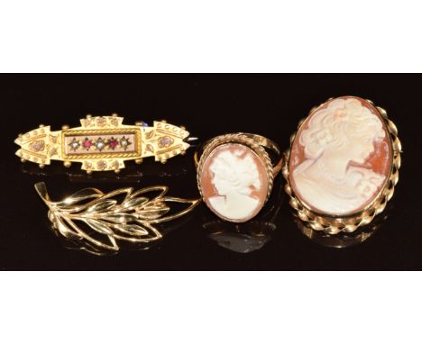 A 9ct gold brooch and ring (size P) each set with a cameo, Edwardian 9ct gold brooch (12.9g) and a yellow metal brooch