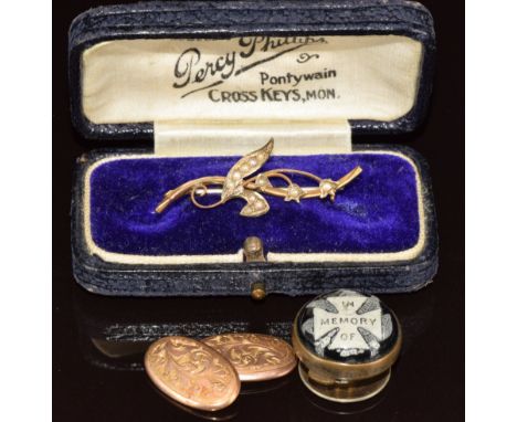A 9ct gold brooch set with seed pearls in antique box, 9ct gold single cufflink (3g) and a Victorian button 'In memory of'