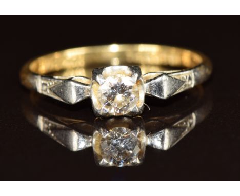 An 18ct gold ring set with a round cut diamond of approximately 0.3ct in a platinum setting, 2.5g, size P