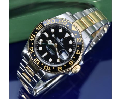 Rolex Oyster Perpetual Date GMT Master II gentleman's automatic wristwatch ref. 116713LN with date aperture, black and gold h