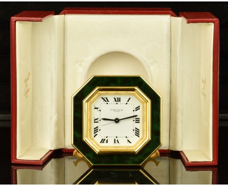 Cartier Paris Art Deco style gilt metal travel alarm clock ref. 7507 with simulated green jade octagonal case, folding stand,