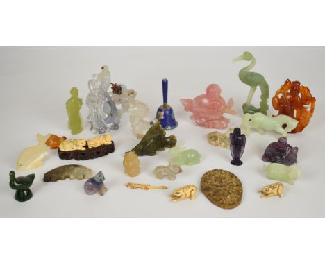 A collection of mainly Chinese jade or similar hardstone / glass / bone figures including mother of pearl fish, heron, cloiso