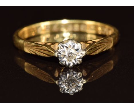 An 18ct gold ring set with a diamond, 2.5g, size M