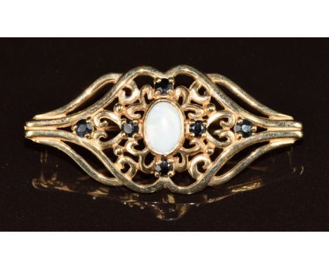 A 9ct gold brooch set with an opal and sapphires, 4.2g, 3.8cm&nbsp;