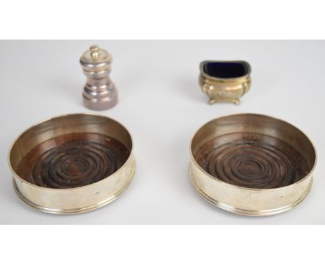 Pair of Elizabeth II feature hallmarked silver wine bottle coasters, London 1987, maker&nbsp;David R Mills, diameter 13cm, ha
