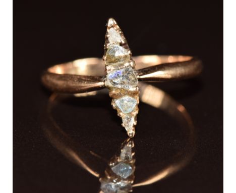 A yellow metal ring set with four diamonds in a marquise shaped setting (one glass replacement), 2.3g, size P