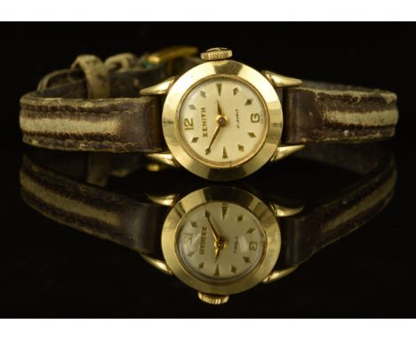 Zenith 9ct gold ladies wristwatch with gold hands and hour markers, silver dial and signed 17 jewel movement, on brown leathe
