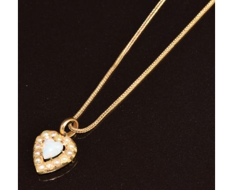 Edwardian 9ct gold pendant in the form of a heart set with a heart cut opal surrounded by seed pearls (1 x 1.4cm) on 9ct gold