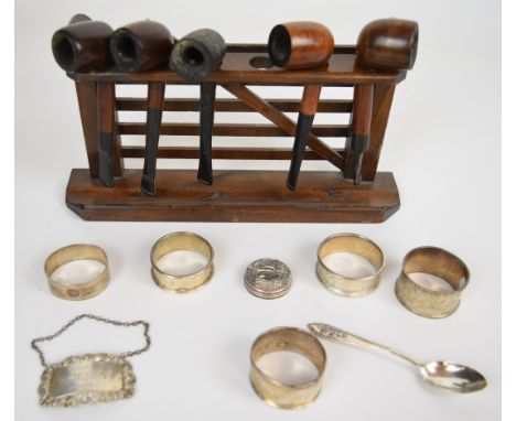 Hallmarked silver bottle ticket for Sherry, napkin rings, spoon, pipe rack with five pipes including Hardcastle, weighable si