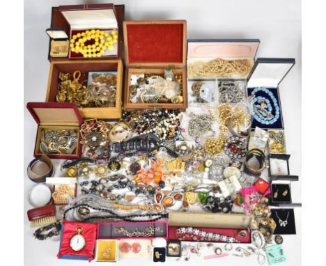 A collection of jewellery including earrings, rose quartz necklace, pewter bangle and pendant, necklaces, Art Deco paste buck