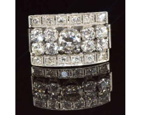 An 18ct gold white gold ring set with round cut diamonds, the centre diamond 0.54ct, the total diamond weight approximately 1