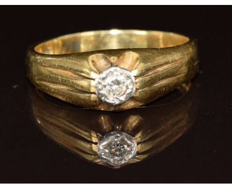 An 18ct gold ring set with a diamond of approximately 0.08ct, 5.3g, size R