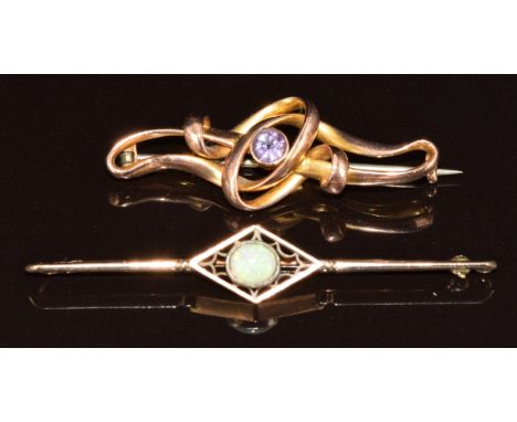 Two c1910 9ct gold brooches, one set with an opal and the other an amethyst, 5g