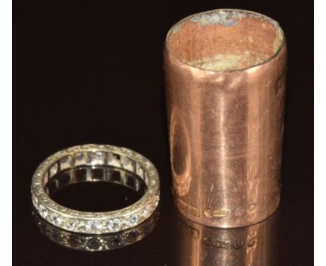 A 9ct gold eternity ring set with synthetic stones (2.4g) and a 15ct gold collar for a walking stick (5.8g)