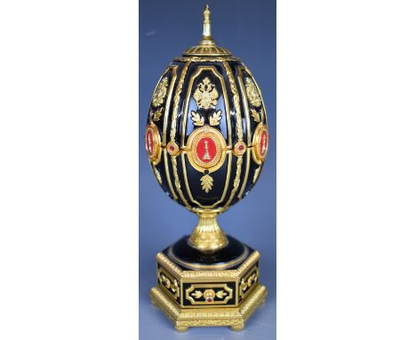 House of Faberg&eacute; Imperial jewelled egg miniature chess set by Franklin Mint, the top lifting off to reveal the board, 