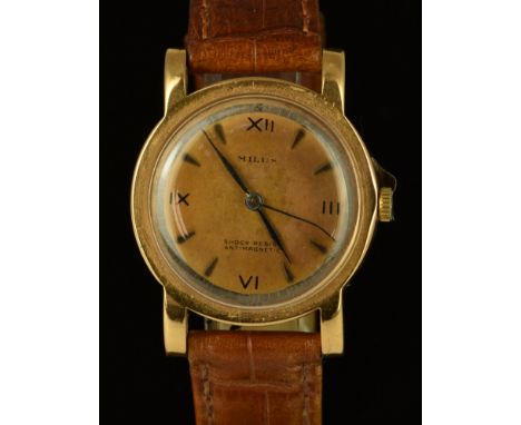 Milus 18ct gold gentleman's wristwatch with blued hands, Roman numerals, bronze dial and mechanical movement, on brown leathe