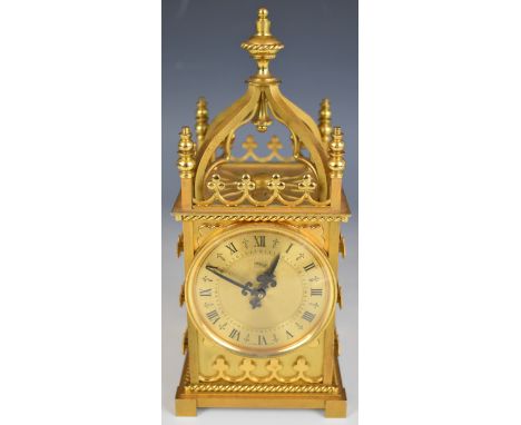 Imhoff Swiss mantel clock of Gothic architectural form, with portcullis design to sides and back and 8 day movement wound via