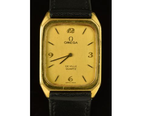 Omega De Ville gentleman's wristwatch with black hands and baton hour markers, gold Arabic numerals and dial, gold plated cas