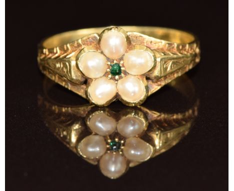 Victorian mourning ring with engraved shoulders, set with an emerald and split pearls and with locket compartment under the h