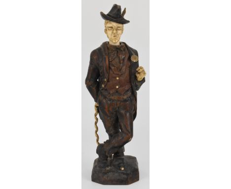 Late 19th / 20thC German / Black Forest carved wood and ivory automaton of a whistling tramp leaning on his stick, with rotat