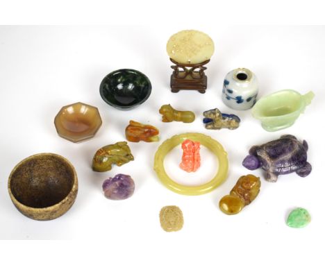 A collection of Chinese jade / glass figures, disc on stand, bracelet, bowls, 18thC porcelain ink pot etc., tallest 9.5cm