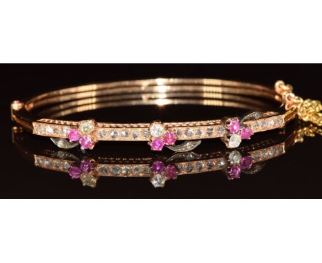 Victorian/ Edwardian 18ct gold bangle set with old cut and rose cut diamonds and pink sapphires in the form of shamrocks, 18.