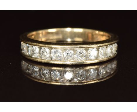 A 9k gold ring set with eleven diamonds, the total diamond weight approximately 0.5ct, 2.9g, size M