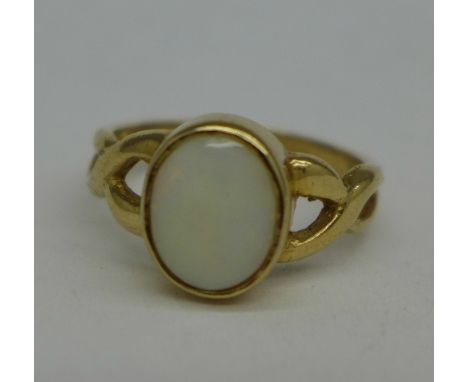 A 9ct gold and opal ring, 3.8g, O