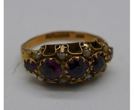 A 9ct gold, amethyst and seed pearl ring, Birmingham 1918, 2.2g, S