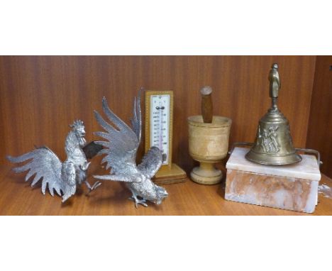 A brass bell, a spice pestle and mortar, two bird centrepieces, a thermometer and an onyx box