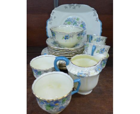 A Crown Staffordshire tea service, lacking one side plate
