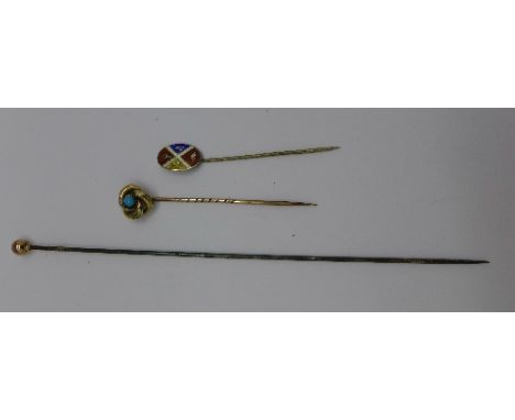 A yellow metal stick pin set with turquoise, a silver stick pin and a 9ct gold topped hat pin