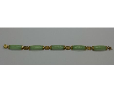 A 9ct gold and jade bracelet
