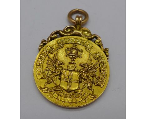 A 15ct gold London Football Association medal, with inscription, L.C.C. Winner Tottenham Hotspur, J. Reddish, 1928-9, hallmar