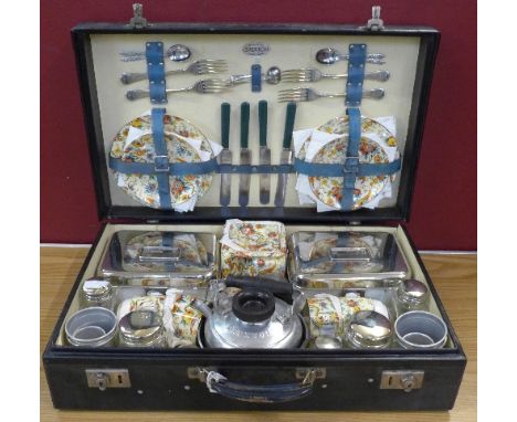 A 1930's Brexton picnic hamper with Grimwades chintz china including cube teapot, four setting