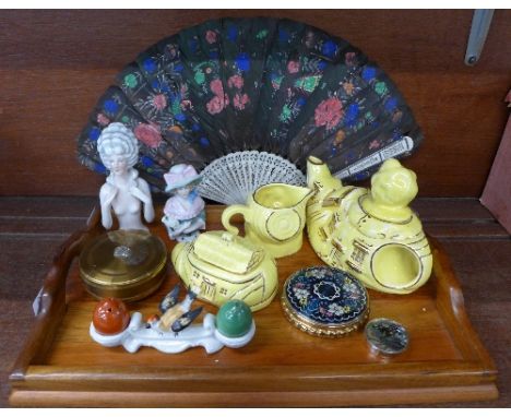 A three piece Lingard novelty tea service, a Kigu compact, two pin cushion dolls, etc.