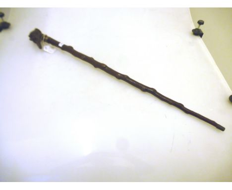 HAZEL SHAFT WALKING STICK WITH CARVED HEAD OF FRENCH PIONEER SOLDIER, ENGRAVED COLLAR WITH 'MARSHALL NEY, WATERLOO 1815' HALL