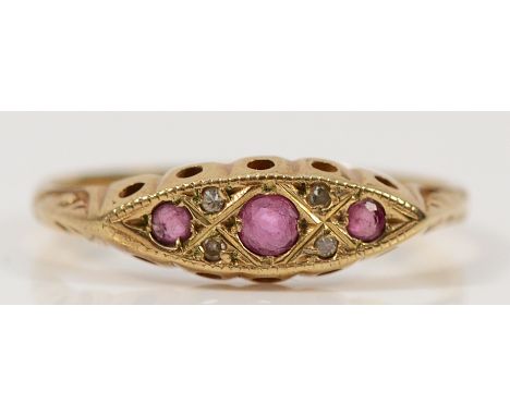 A 9ct gold diamond and ruby dress ring, M, 1.4g