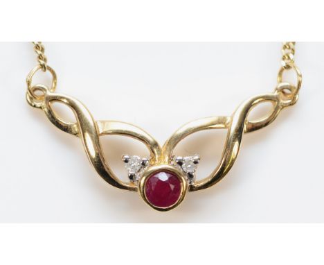 A 9ct gold diamond a ruby twisted front necklace, 20mm front, 2.7g