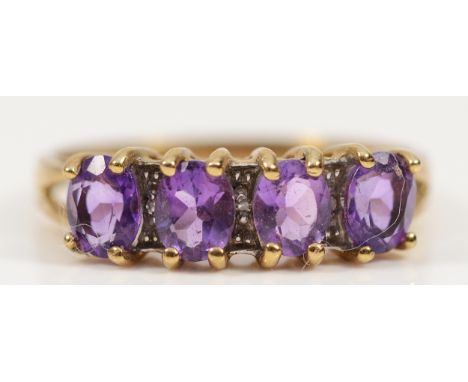 A 9ct gold amethyst and diamond dress ring, P, 2.2g