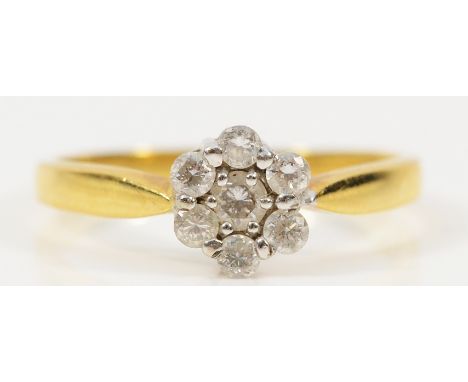 An 18ct gold brilliant cut diamond floral cluster ring, L 1/2, 2.5g
